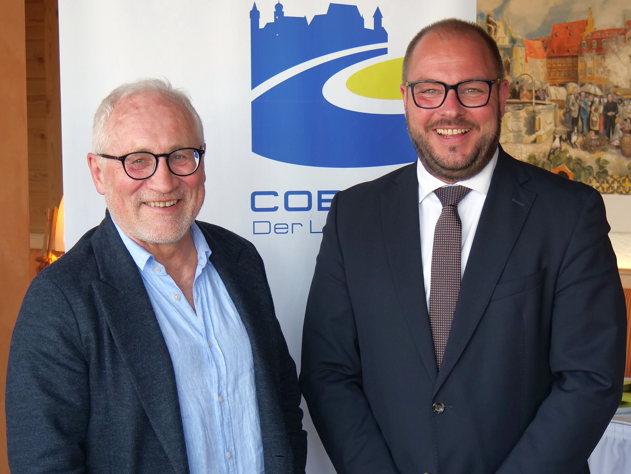 Michael Fischer und Sebastian Straubel stehen nebeneinander.